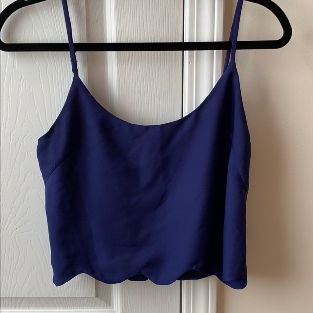 Blue tank with scalloped bottom